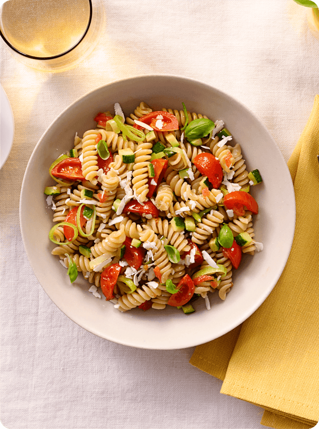 Barilla - Al Bronzo - FUSILLI WITH COURGETTES, FRESH BASIL, CHERRY TOMATOES AND SALTED RICOTTA SLICES