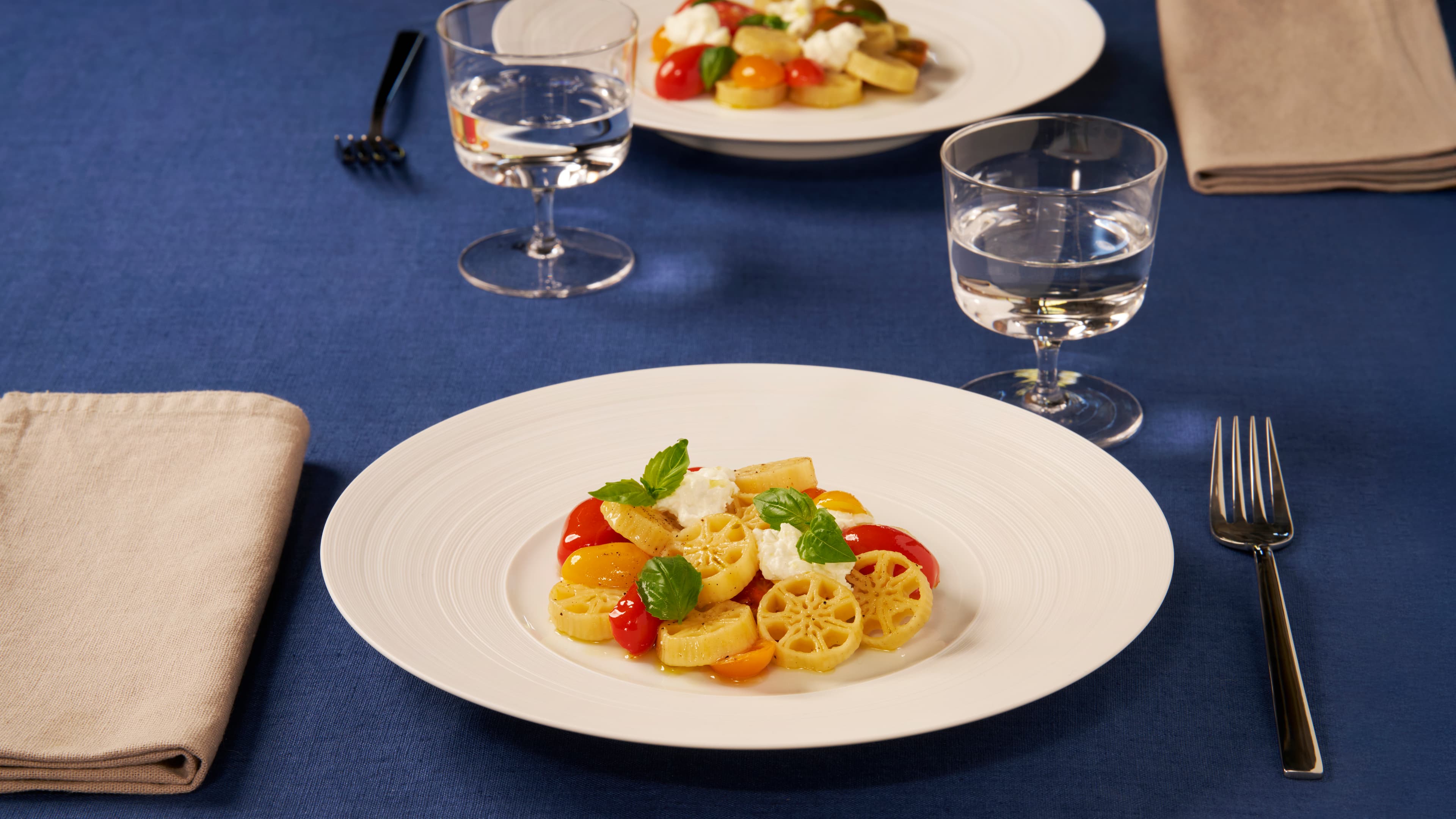 Gran Ruote con tomates cherry heirloom asados y burrata